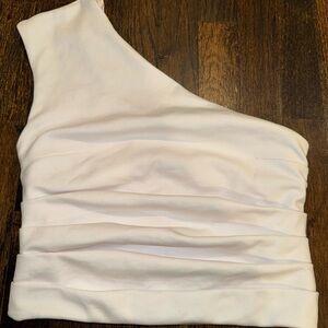 A one shoulder white shirt from Zara, barely even worn.